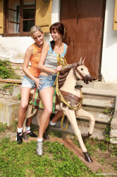 Riding-the-wooden-horse-naked