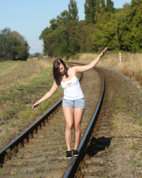 Peeing on a railroad track