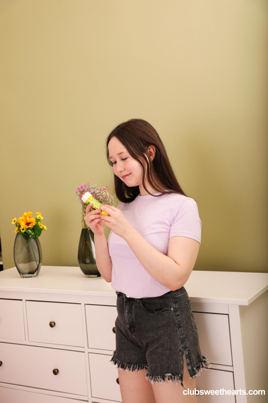 Lesly Nilson blowing bubbles for attention
