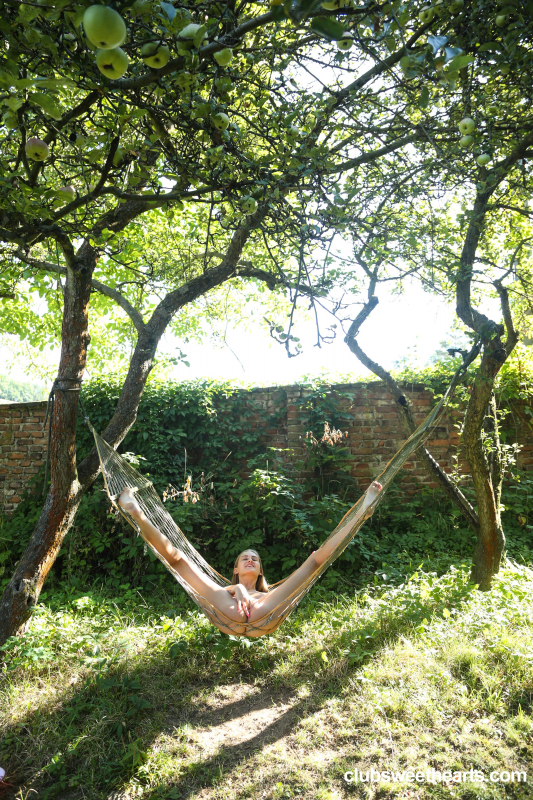 Cutie pie finger fucking in a hammock