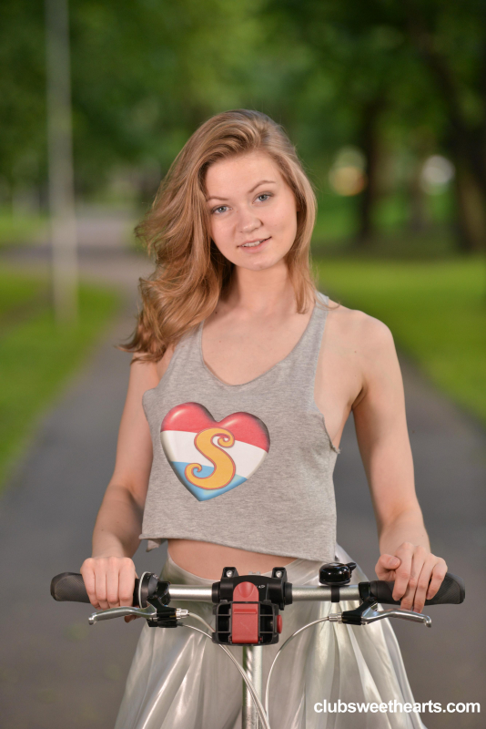 Cam girl Merry Pie riding her bike without panties