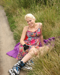 Roller skate girl Cathy pleases herself