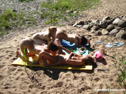 Sweet-lesbians-making-out-on-the-beach