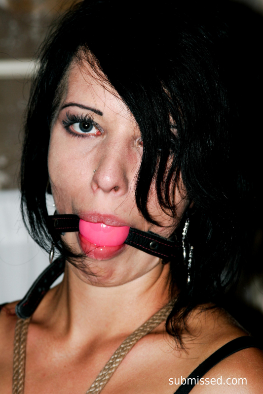 Lucy on a string bound up tight ballgagged