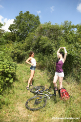 Young-lesbians-playing-with-each-other-outdoors