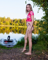 Alice Flore plays on the lake